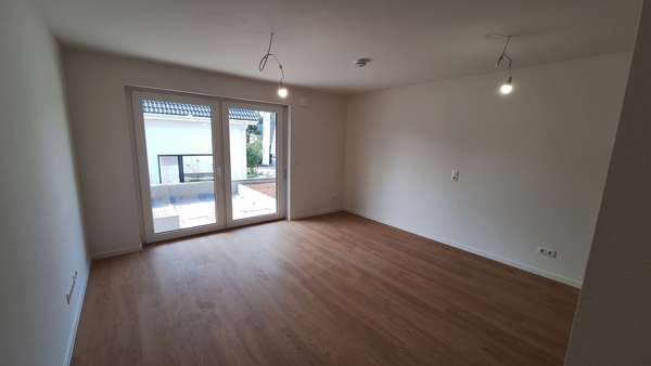Wohnzimmer - Erdgeschosswohnung in 74243 Langenbrettach mit 60m² kaufen