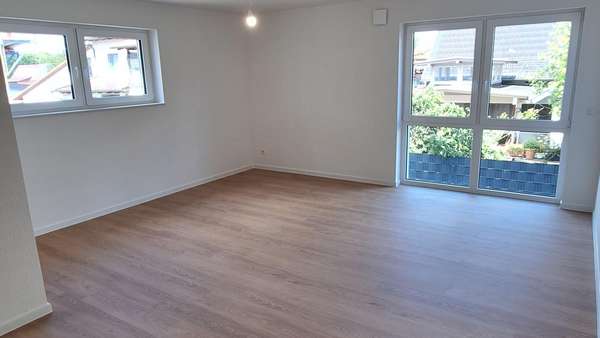 Wohnzimmer - Etagenwohnung in 74243 Langenbrettach mit 90m² kaufen