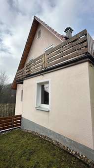 Außenansicht hinter dem Haus Außenansicht hinter dem Haus - Zweifamilienhaus in 72270 Baiersbronn mit 1m² kaufen
