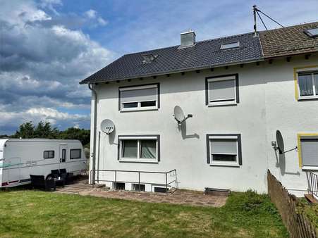 Außenansicht Außenansicht - Doppelhaushälfte in 72285 Pfalzgrafenweiler mit 129m² als Kapitalanlage kaufen