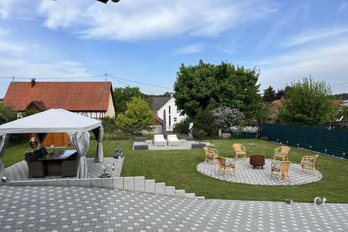 Gartenanlage mit 3 Sitzbereichen Gartenanlage mit 3 Sitzbereichen - Einfamilienhaus in 78598 Königsheim mit 130m² kaufen
