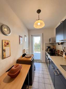 Küche mit kl. Balkon - Etagenwohnung in 88471 Laupheim mit 58m² kaufen