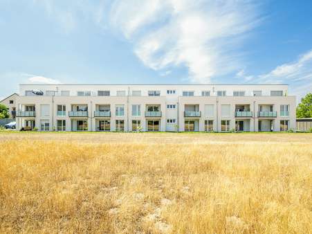 Rückansicht Rückansicht - Etagenwohnung in 68753 Waghäusel mit 67m² kaufen