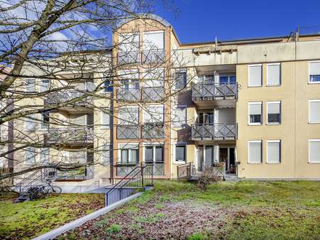 Fassade Grünfläche - Etagenwohnung in 76189 Karlsruhe / Oberreut mit 26m² kaufen