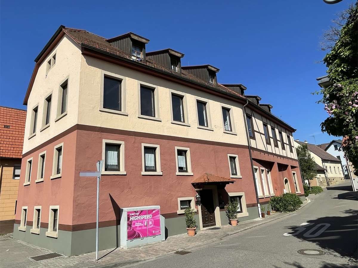 Blick auf das Haus - Mehrfamilienhaus in 76646 Bruchsal mit 303m² kaufen