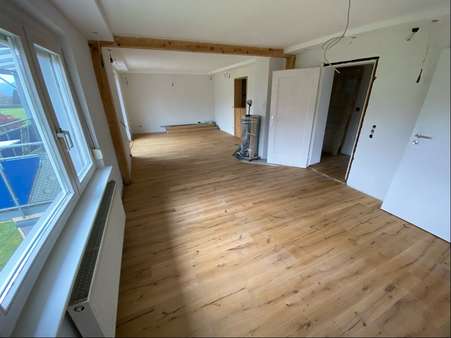 Wohnbereich mit Schwedenofen - Etagenwohnung in 77736 Zell mit 65m² kaufen