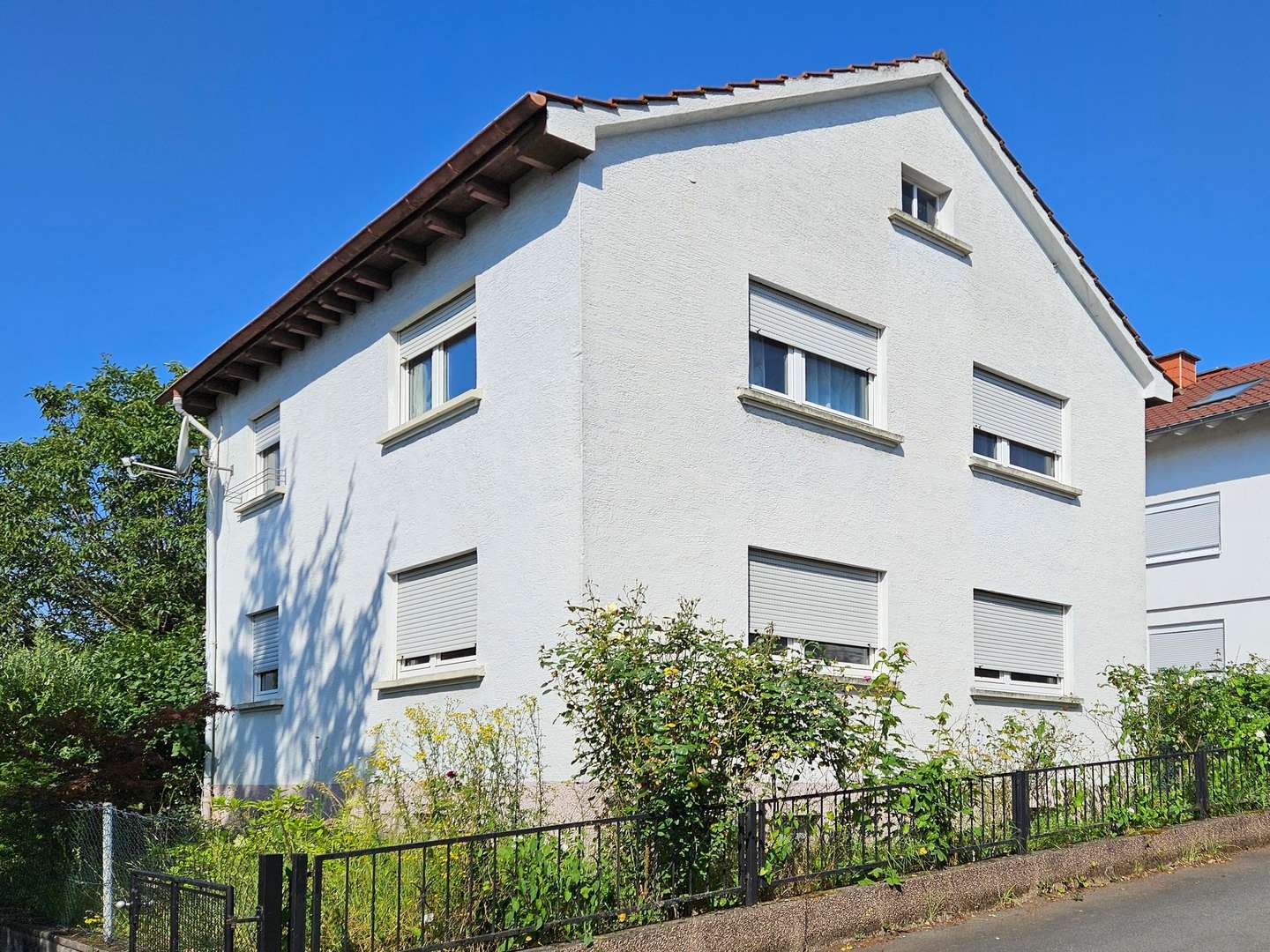 Straßenansicht - Zweifamilienhaus in 69168 Wiesloch mit 106m² kaufen