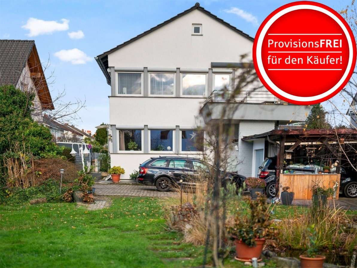 Blick aus dem Garten auf das Haus Blick aus dem Garten auf das Haus - Zweifamilienhaus in 79114 Freiburg mit 182m² kaufen
