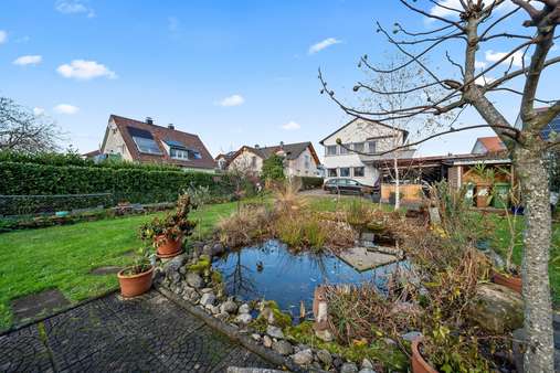 Gartenausschnitt Gartenausschnitt - Zweifamilienhaus in 79114 Freiburg mit 182m² kaufen