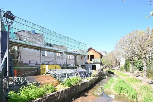 Rohbau mit genehmigtem Bauantrag an idyllischem Bachlauf gelegen 