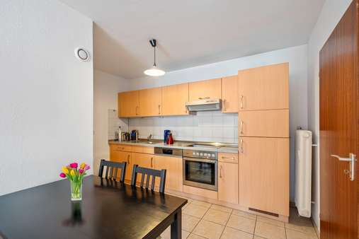 Blick zur Einbauküche - Etagenwohnung in 79194 Gundelfingen mit 59m² kaufen