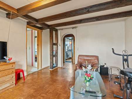 Wohnzimmer mit Zugang zu Schlafzimmer und Flur - Etagenwohnung in 88046 Friedrichshafen mit 49m² kaufen