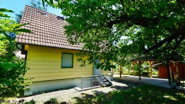 Blick vom Garten Blick vom Garten - Einfamilienhaus in 88682 Salem mit 61m² kaufen