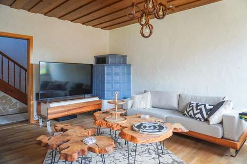 Wohnzimmer EG + Kachelofen Wohnzimmer EG + Kachelofen - Einfamilienhaus in 88682 Salem mit 205m² kaufen