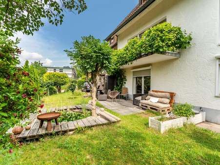 Ansicht Garten / Terrasse der Einliegerwohnung - Doppelhaushälfte in 78089 Unterkirnach mit 190m² kaufen
