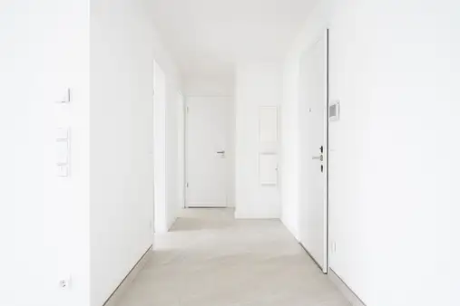 Neubau - Hochwertige Erdgeschosswohnung mit sonnigem Garten