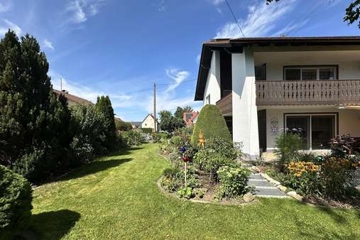 Westgarten mit Terrasse und Balkon Westgarten mit Terrasse und Balkon - Einfamilienhaus in 86859 Igling mit 153m² kaufen