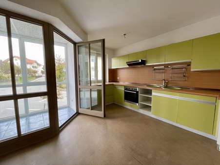 Küche mit Zugang zum Wintergarten - Etagenwohnung in 82377 Penzberg mit 82m² kaufen