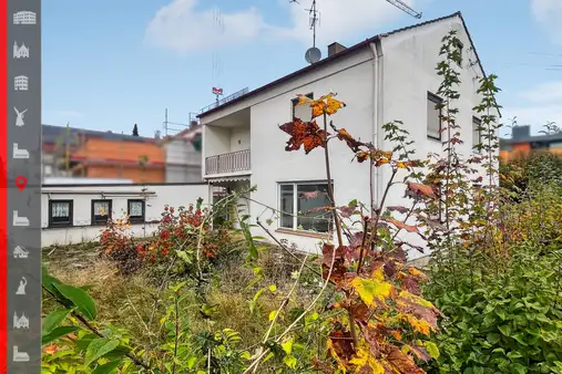 Sonniges Südgrundstück mit einer Baugenehmigung für zwei Doppelhaushälften in ruhiger Lage 