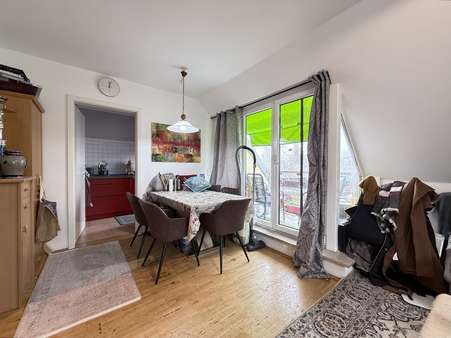 Wohnbereich / Esszimmer - Dachgeschosswohnung in 80999 München mit 50m² kaufen