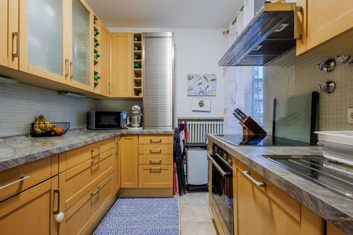 Küche mit Balkon - Etagenwohnung in 81673 München mit 85m² kaufen
