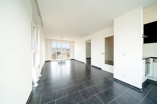 Wohnzimmer - Dachgeschosswohnung in 80687 München mit 53m² kaufen