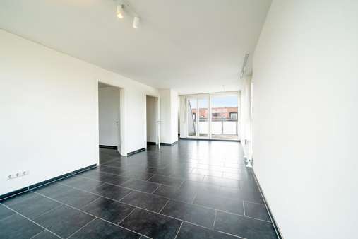 Wohnzimmer - Dachgeschosswohnung in 80687 München mit 53m² kaufen