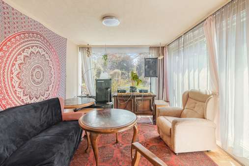 Wohnzimmer -  Erdgeschoss - Doppelhaushälfte in 81825 München mit 141m² kaufen