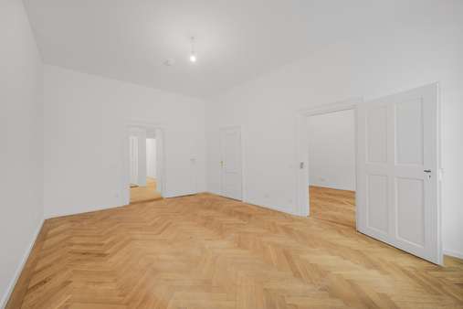 Wohnzimmer - Etagenwohnung in 80469 München mit 106m² kaufen