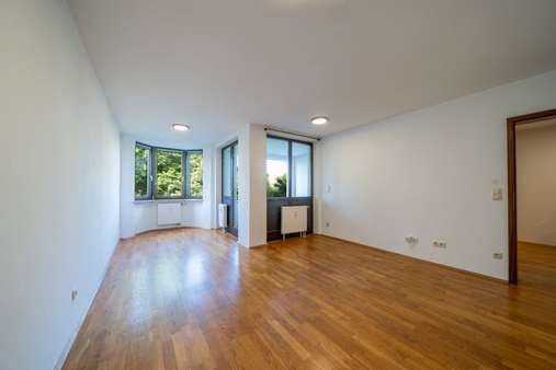 Wohnzimmer - Etagenwohnung in 81241 München mit 60m² kaufen