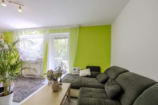 Wohnzimmer Wohnzimmer - Etagenwohnung in 81539 München mit 100m² kaufen