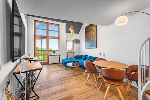 Wohnzimmer Wohnzimmer - Dachgeschosswohnung in 81739 München mit 63m² kaufen