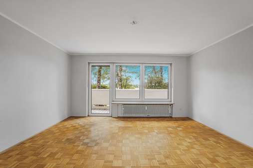 Wohnzimmer EG - Erdgeschosswohnung in 81476 München mit 77m² kaufen
