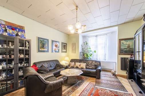 Wohnzimmer - Etagenwohnung in 81371 München mit 99m² kaufen