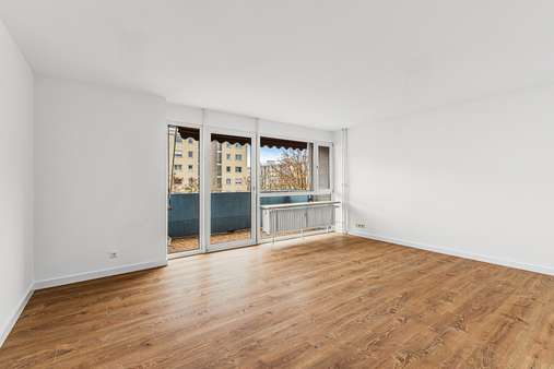 Wohnzimmer - Etagenwohnung in 82256 Fürstenfeldbruck mit 68m² kaufen