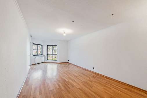 Wohnzimmer - Etagenwohnung in 81476 München mit 63m² kaufen