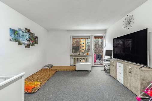Wohnzimmer - Etagenwohnung in 80636 München mit 54m² kaufen