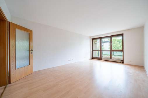 Wohnzimmer - Etagenwohnung in 81375 München mit 61m² kaufen