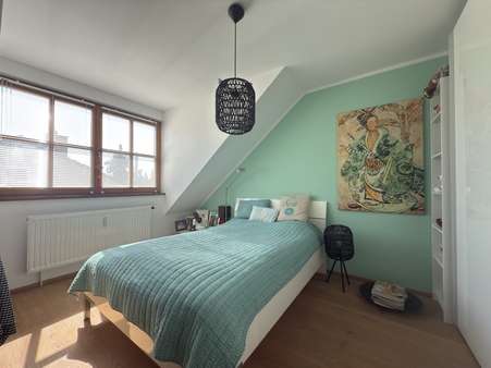 Schlafzimmer - Dachgeschosswohnung in 81476 München mit 51m² kaufen