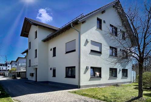 Aussenansicht - Etagenwohnung in 85609 Aschheim mit 56m² kaufen