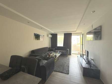 Wohnzimmer Wohnzimmer - Etagenwohnung in 80992 München mit 89m² kaufen