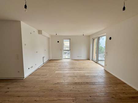 Wohnzimmer Wohnzimmer - Etagenwohnung in 85757 Karlsfeld mit 82m² mieten
