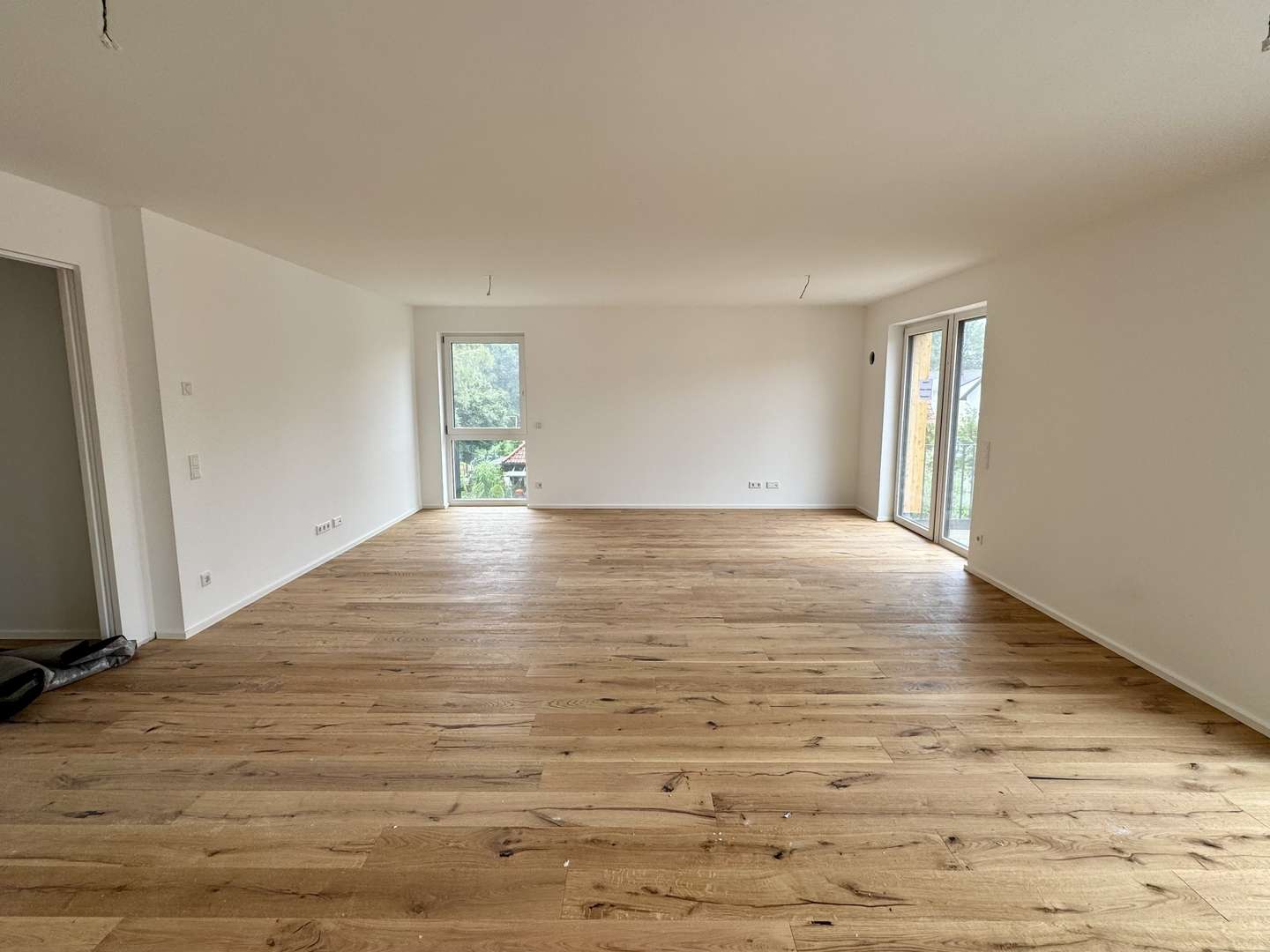Wohnzimmer - Etagenwohnung in 85757 Karlsfeld mit 116m² mieten