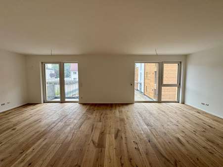 Wohnzimmer Wohnzimmer - Etagenwohnung in 85757 Karlsfeld mit 117m² mieten