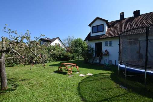 Nordansicht mit Garten - Einfamilienhaus in 82380 Peißenberg mit 128m² kaufen