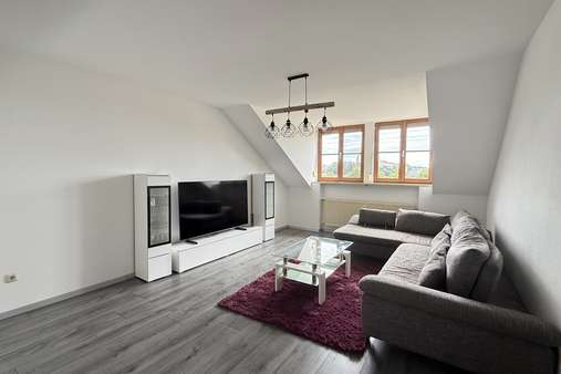 Wohnzimmer - Dachgeschosswohnung in 84524 Neuötting mit 72m² kaufen