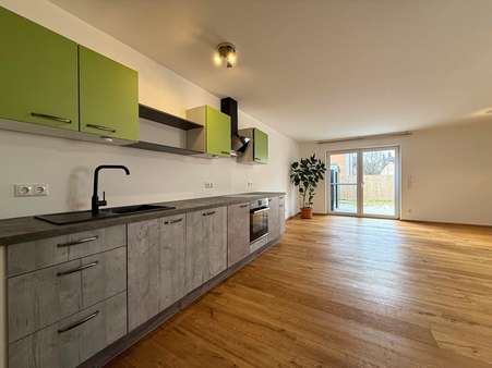 Blick in den Wohnbereich - Erdgeschosswohnung in 84130 Dingolfing mit 83m² kaufen