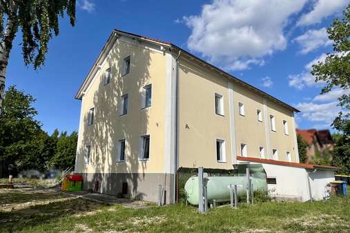 Seitenansicht - Dachgeschosswohnung in 84140 Gangkofen mit 72m² kaufen