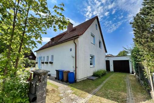 Außen - Westansicht Außen - Westansicht - Einfamilienhaus in 81739 München mit 110m² kaufen