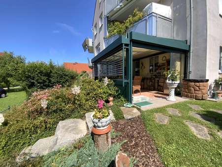 Garten mit Wintergarten - Erdgeschosswohnung in 92526 Oberviechtach mit 93m² kaufen